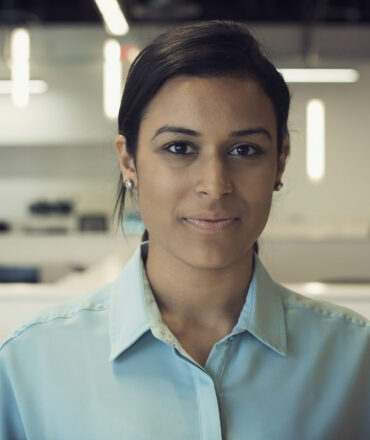 Young woman working in office, portrait